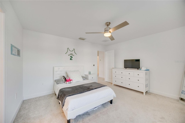 carpeted bedroom with ceiling fan