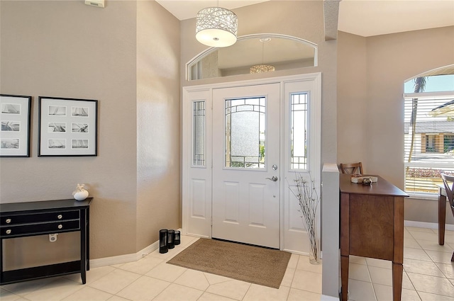 foyer featuring light tile patterned floors