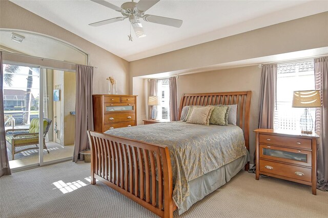 bedroom featuring access to outside, ceiling fan, and light colored carpet