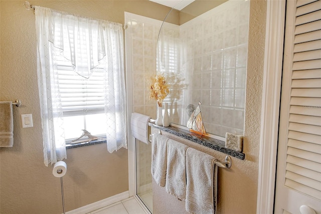 bathroom featuring tile patterned flooring