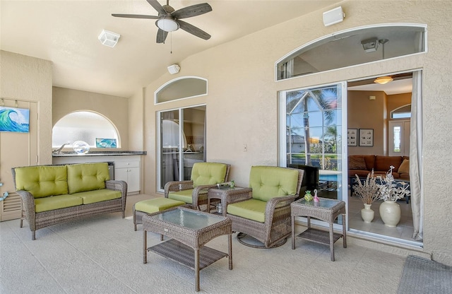 view of patio / terrace featuring ceiling fan