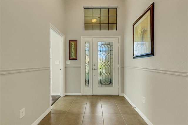 entrance foyer featuring light tile patterned floors