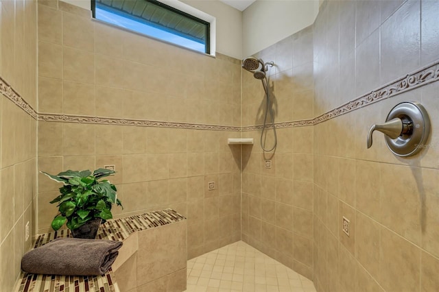 bathroom featuring tiled shower