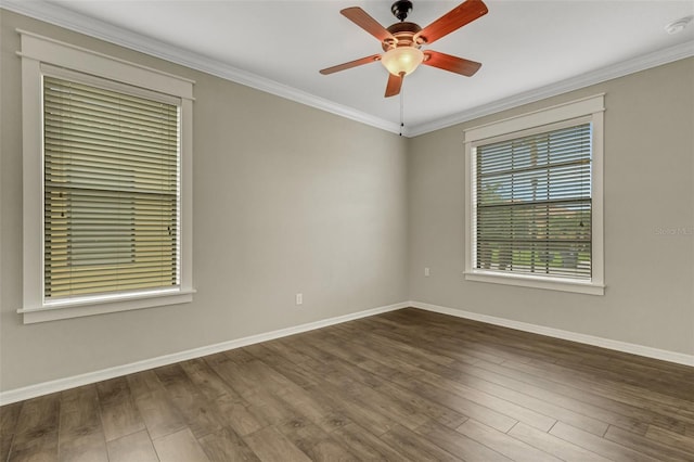 spare room with ceiling fan, dark hardwood / wood-style flooring, and ornamental molding