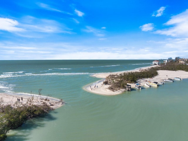 aerial view with a view of the beach and a water view