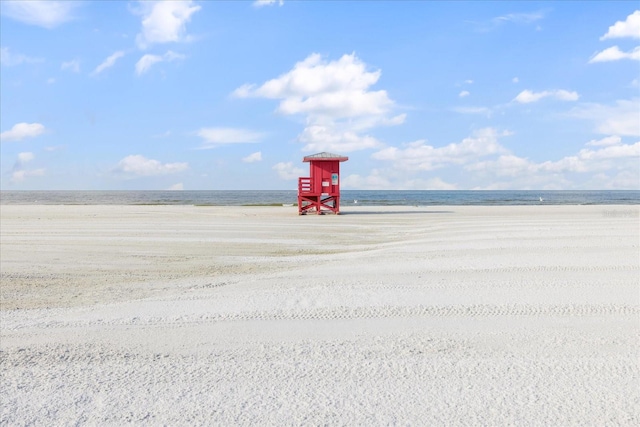 property view of water featuring a beach view