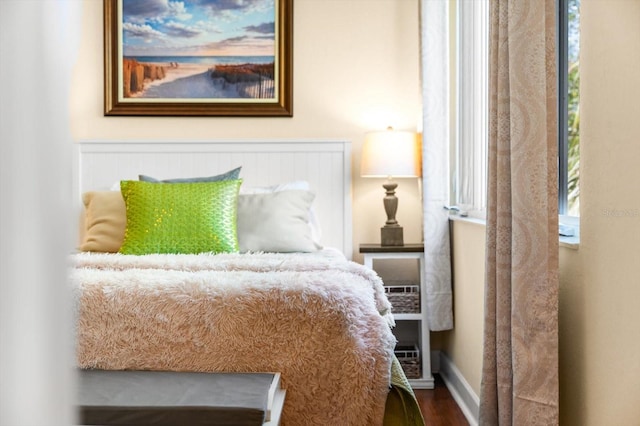 bedroom featuring wood-type flooring