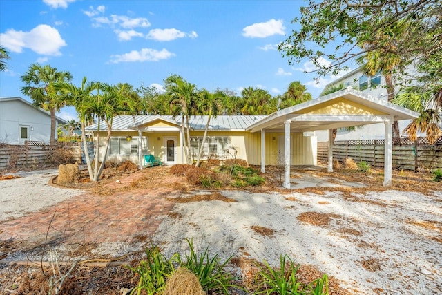 view of front of house featuring a carport