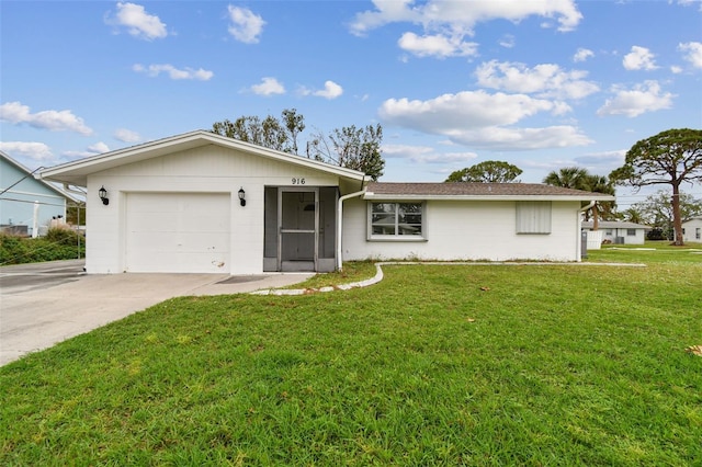 ranch-style home with a garage and a front lawn