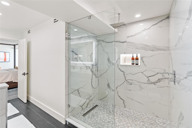 bathroom with tiled shower