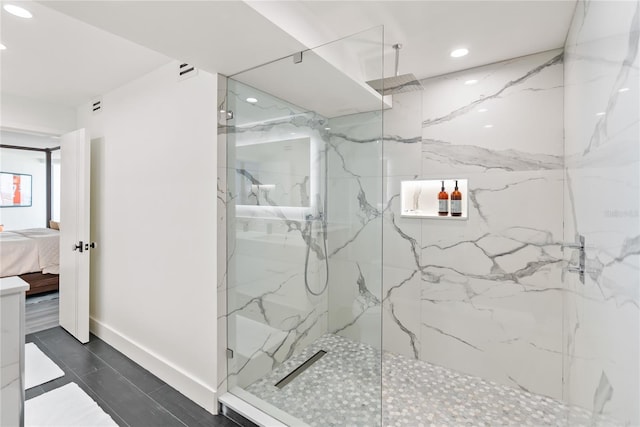 888 Blvd Of The Arts Unit 1705, Sarasota, FL 34236 - full bath featuring recessed lighting, ensuite bathroom, a marble finish shower, and baseboards