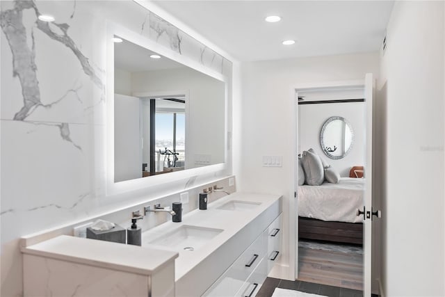 bathroom with wood-type flooring and vanity