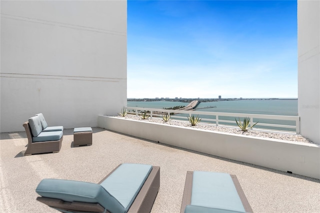 888 Blvd Of The Arts Unit 1705, Sarasota, FL 34236 - view of patio / terrace featuring a balcony and a water view
