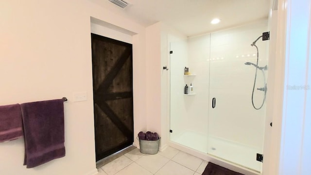 bathroom featuring a stall shower, recessed lighting, visible vents, and tile patterned floors