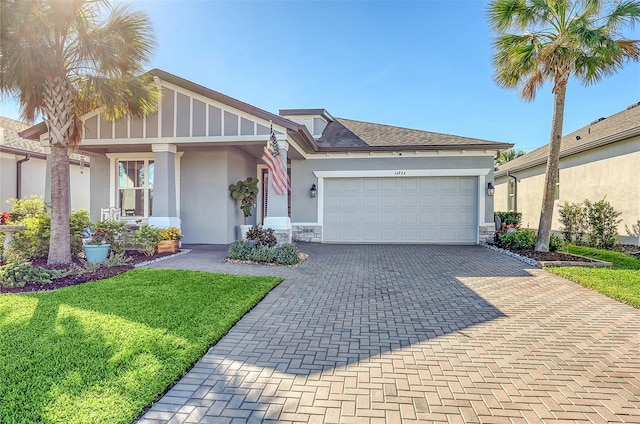 view of front of property featuring a garage