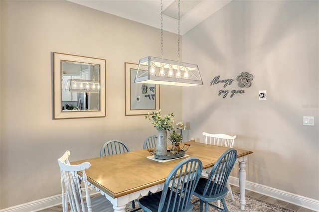 dining area featuring hardwood / wood-style flooring