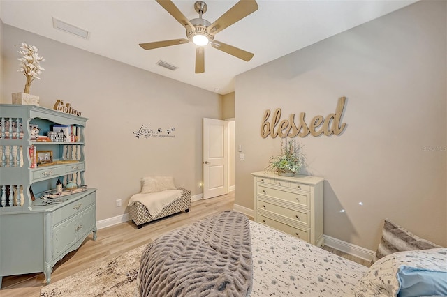 bedroom featuring light wood-type flooring and ceiling fan