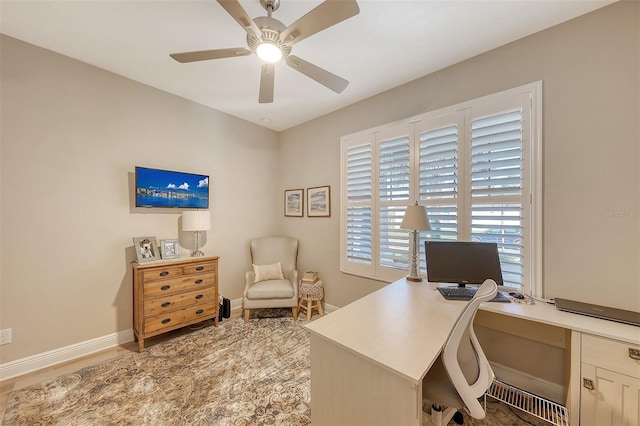 14924 Sora Way, Bradenton, FL 34212 - office area with a ceiling fan, baseboards, and wood finished floors