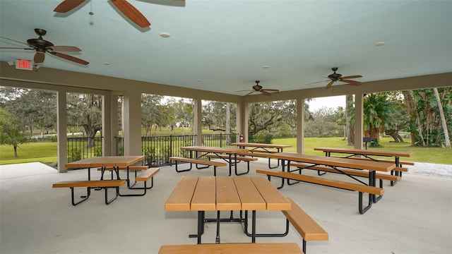 view of community with a patio area and a yard