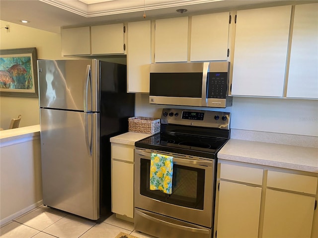 kitchen featuring light tile patterned floors and appliances with stainless steel finishes