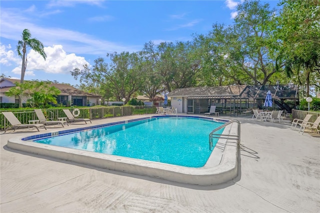 view of pool featuring a patio area