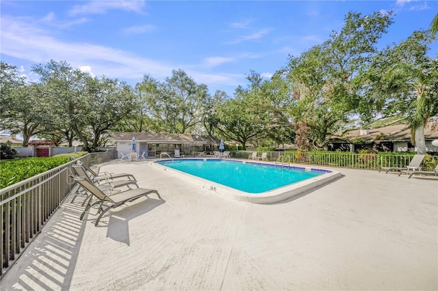 view of pool featuring a patio