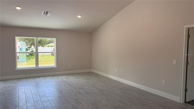 3325 Stockton Ave, North Port, FL 34286 - empty room featuring baseboards, wood finished floors, and recessed lighting