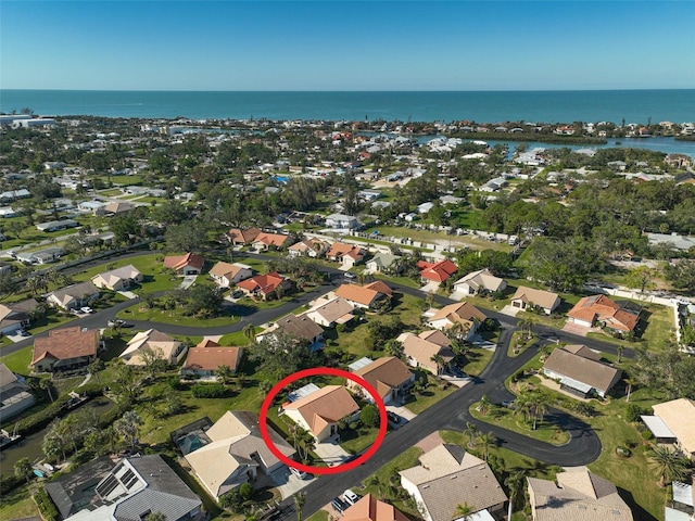 aerial view featuring a water view and a residential view