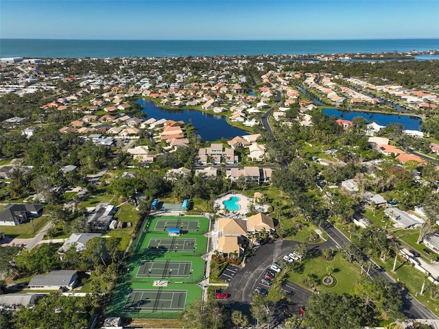 bird's eye view with a residential view and a water view