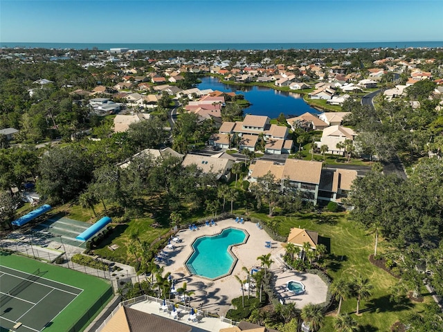 aerial view featuring a residential view and a water view