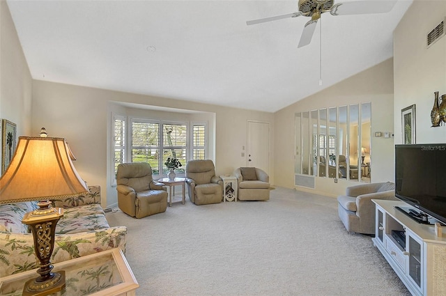 living room with high vaulted ceiling, light carpet, ceiling fan, and visible vents