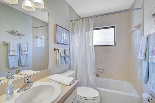 full bath with a textured ceiling, toilet, vanity, and shower / bathtub combination with curtain