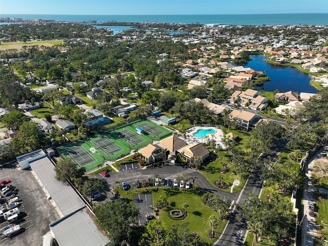 aerial view featuring a water view and a residential view