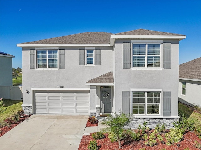 view of front of property featuring a garage