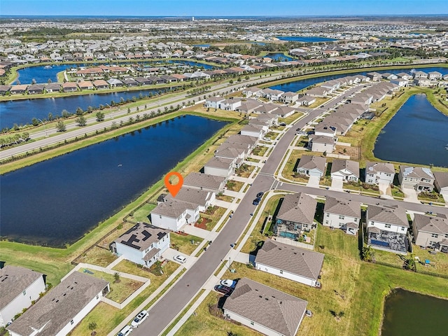 drone / aerial view with a water view