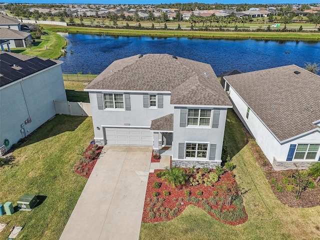 bird's eye view with a water view