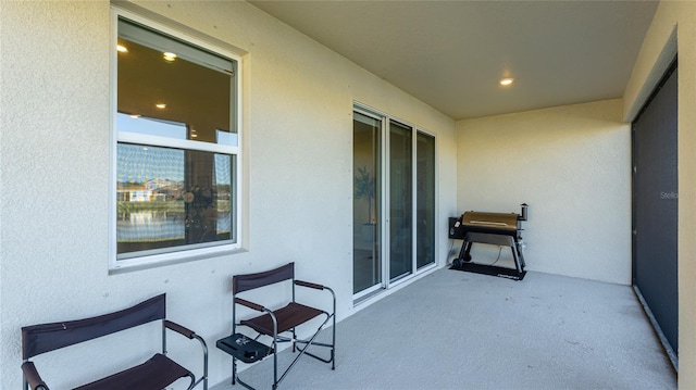 balcony featuring a patio area