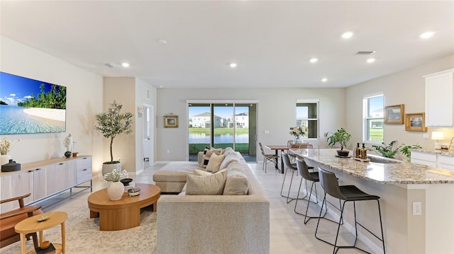 living room with plenty of natural light