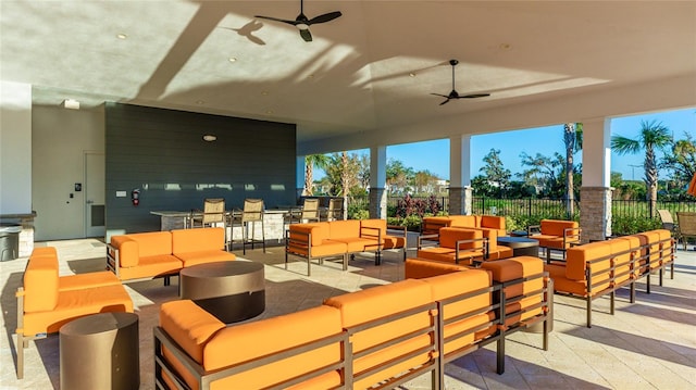 view of patio / terrace with an outdoor living space and ceiling fan