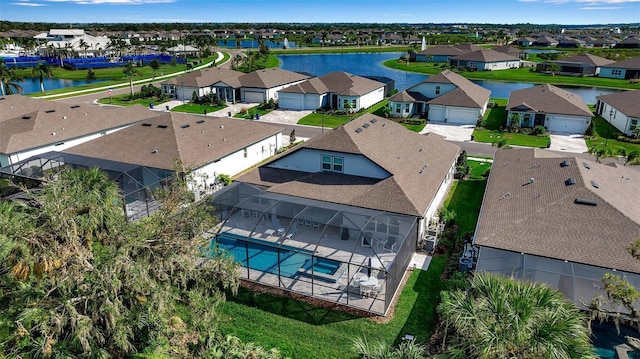 aerial view featuring a water view