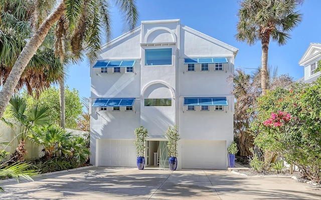 coastal home with a garage