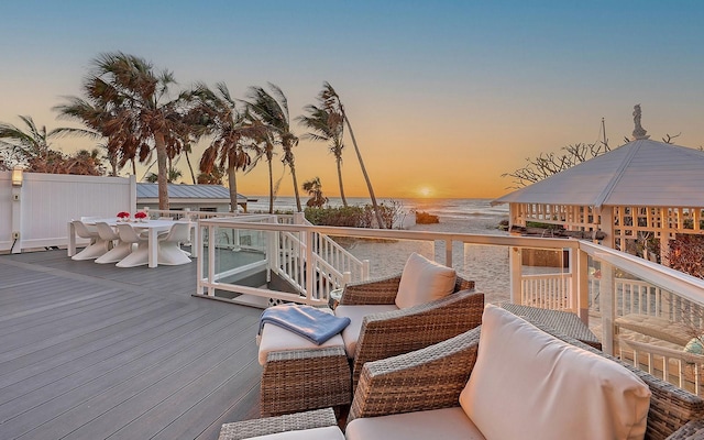 deck at dusk with a water view