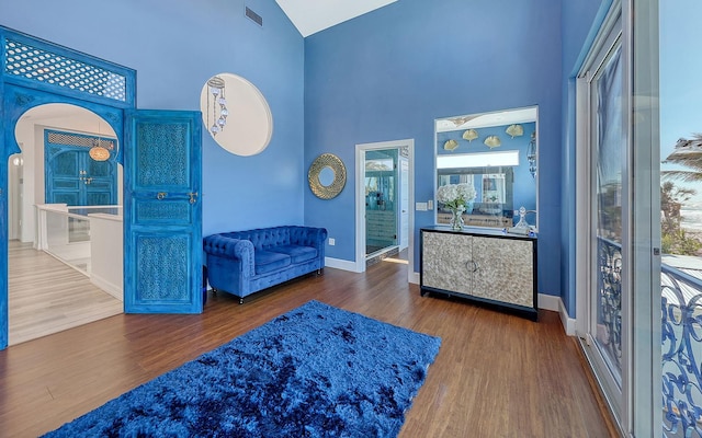 681 Casey Key Rd, Nokomis, FL 34275 - living area with high vaulted ceiling and wood finished floors