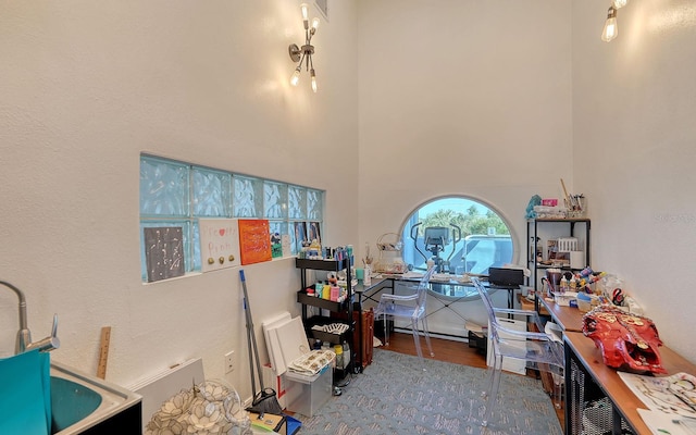 681 Casey Key Rd, Nokomis, FL 34275 - office space with a towering ceiling and wood finished floors