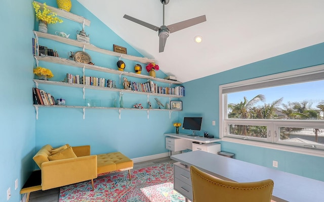 office featuring hardwood / wood-style floors, ceiling fan, and lofted ceiling