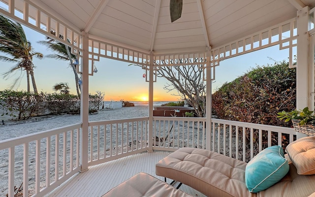 deck at dusk with a gazebo