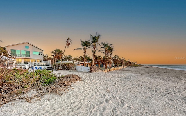 exterior space featuring a beach view