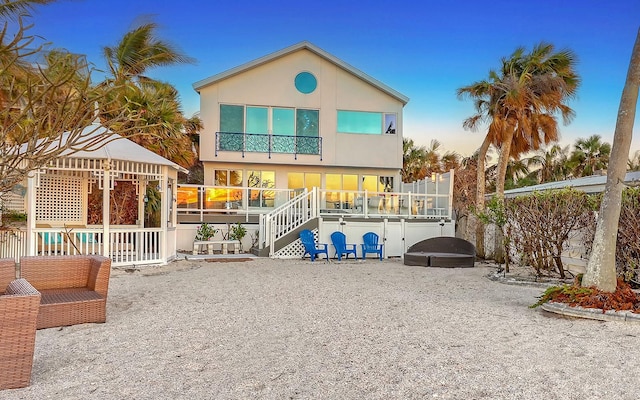 681 Casey Key Rd, Nokomis, FL 34275 - back of property featuring stairs and a patio
