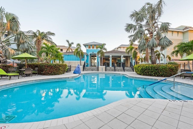 view of swimming pool featuring a patio