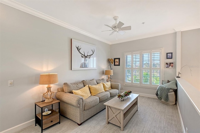 carpeted living room featuring ceiling fan and crown molding